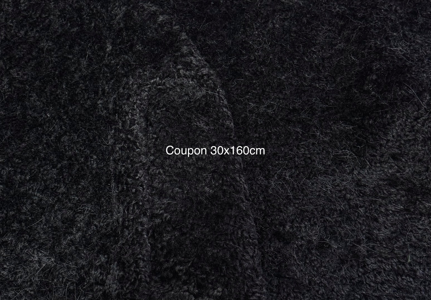 Coupon fausse fourrure noire bouclée – poils 1,5 cm – 30x160 cm