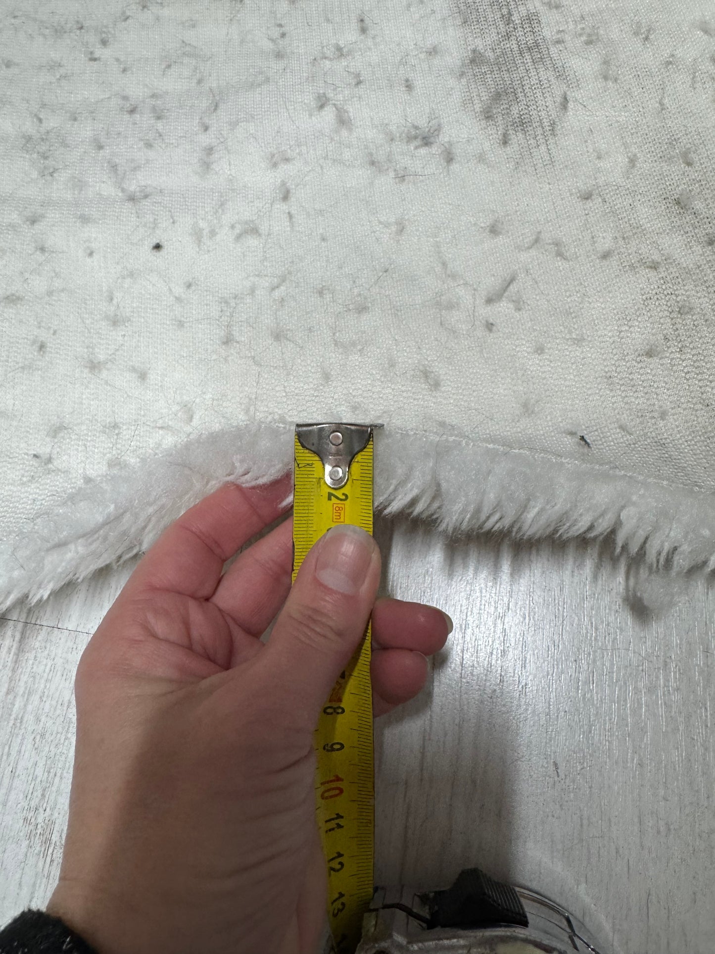 Coupon tissu fausse fourrure douce à poils mi-longs frisés blanc 23cm x 65cm