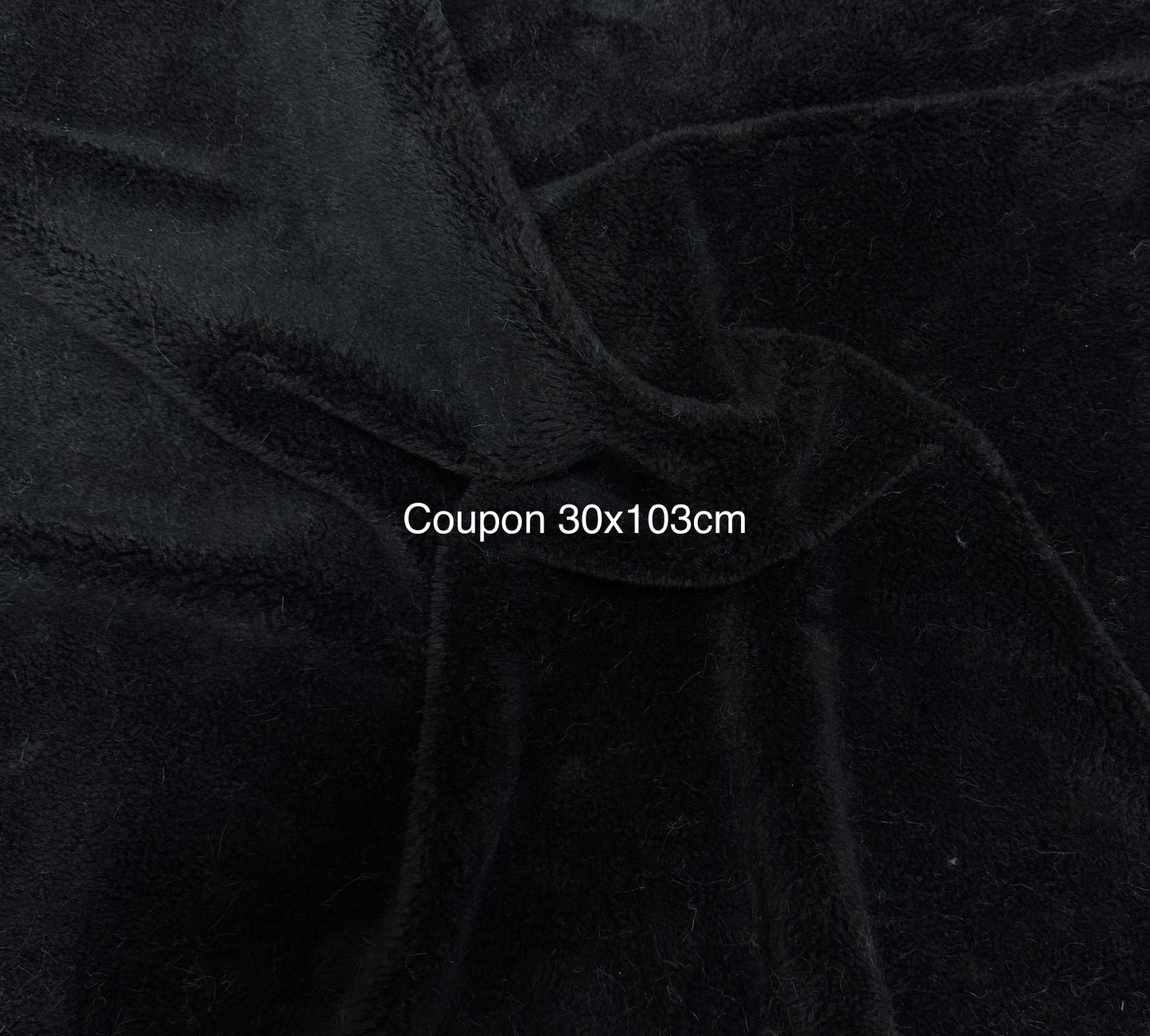 Coupon tissu fausse fourrure noire bouclée effet mouton 30x103 cm