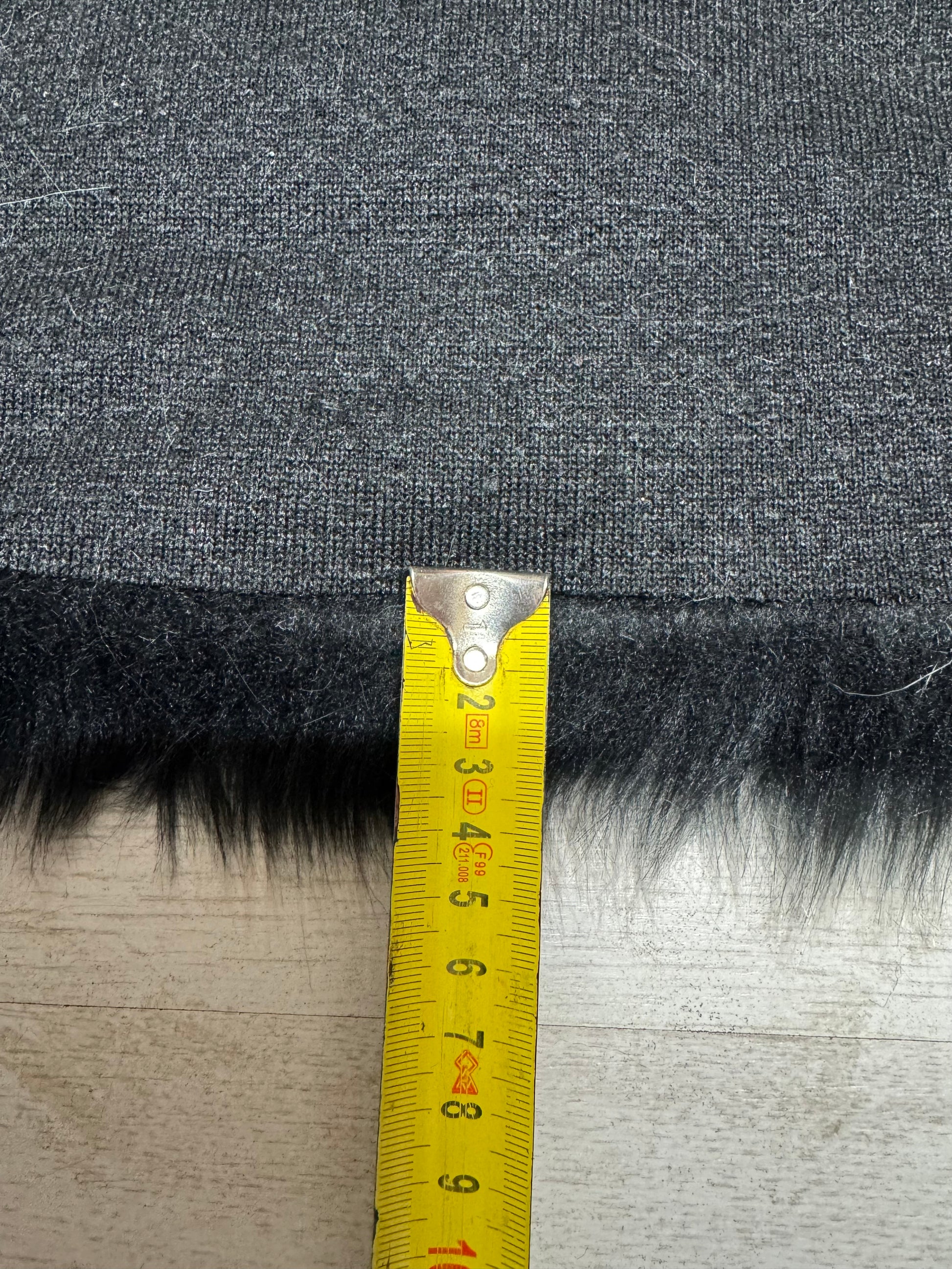 Coupon de fausse fourrure noire mèches blanches texture douce pour ours de collection et cosplay