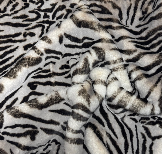 Fausse fourrure zébrée épaisse et douce poils mi-longs 2,5 cm vue texture