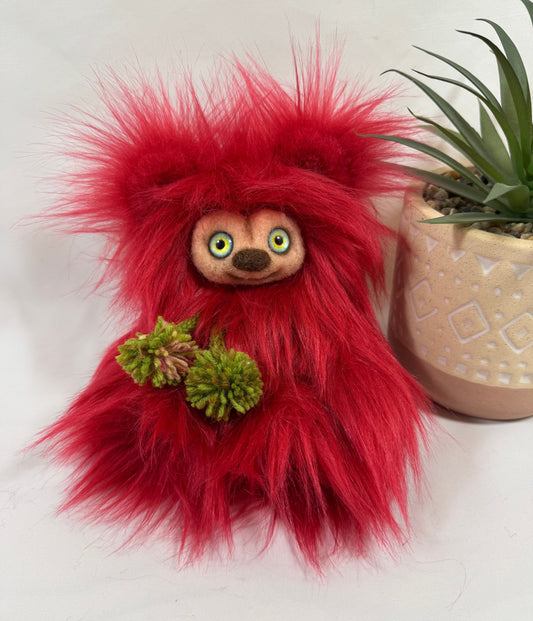 Ours de collection Tao 17 cm en fausse fourrure rouge avec écharpe à pompons verts